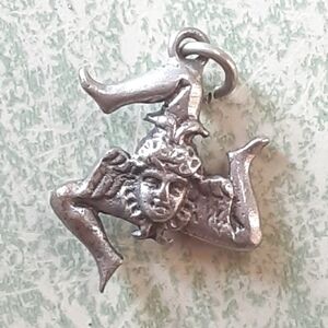 Antique vintage charm pendant three legs of Mann